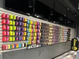 Rows of products on shelves at Cannabis 21 Plus dispensary